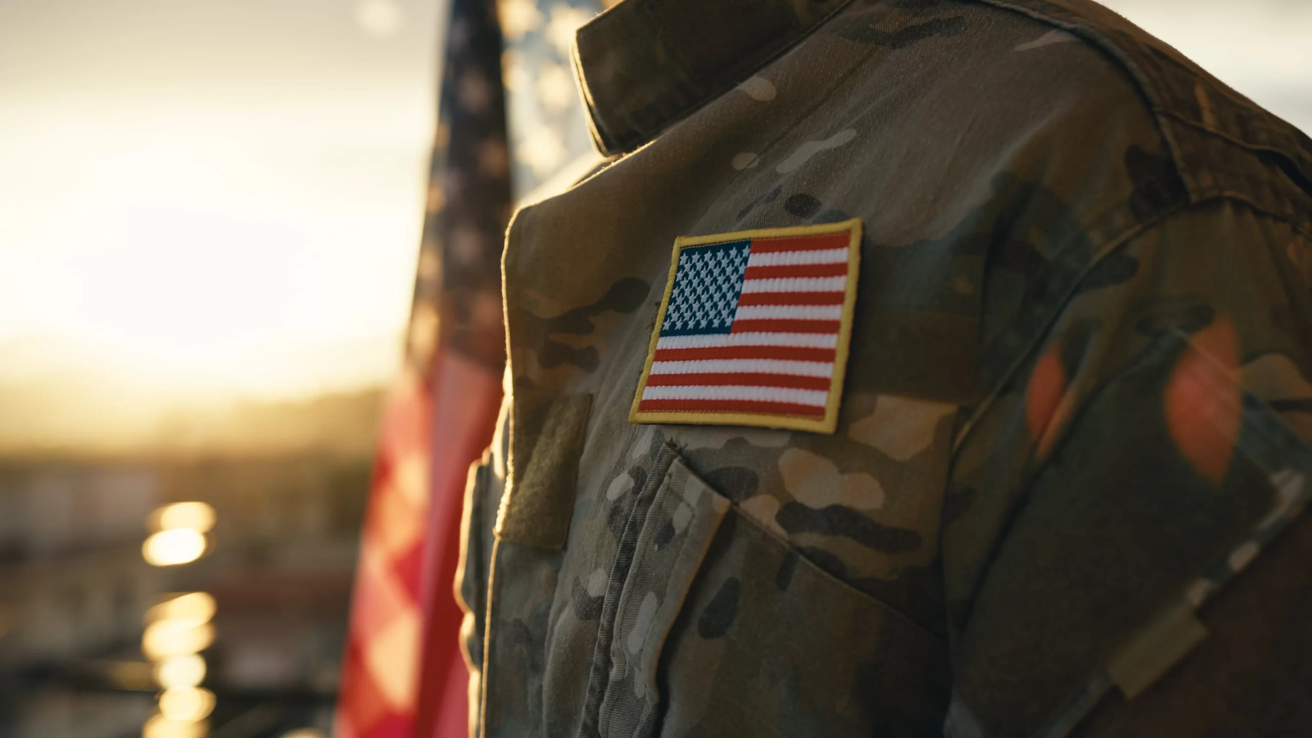 Close-up of an American flag patch on a soldier's uniform